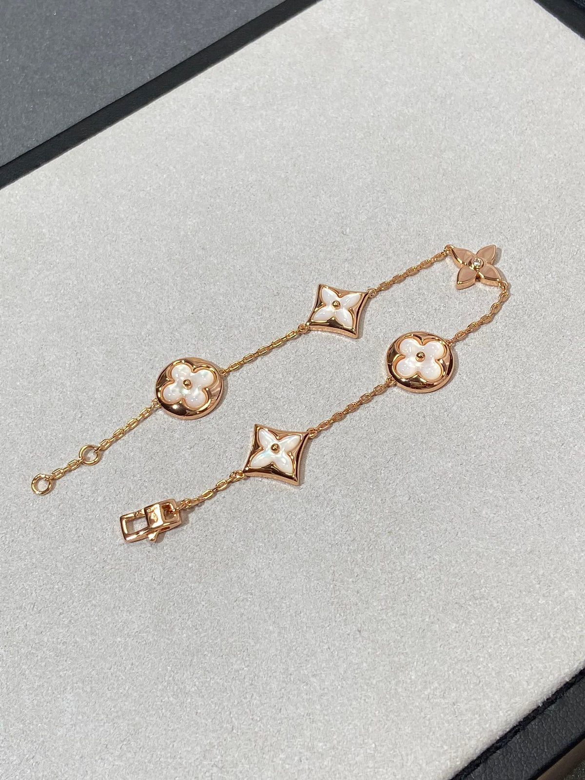 [Zalyn Jewelry ]STAR AND SUN 5 MOTIF MOP PINK GOLD BRACELET