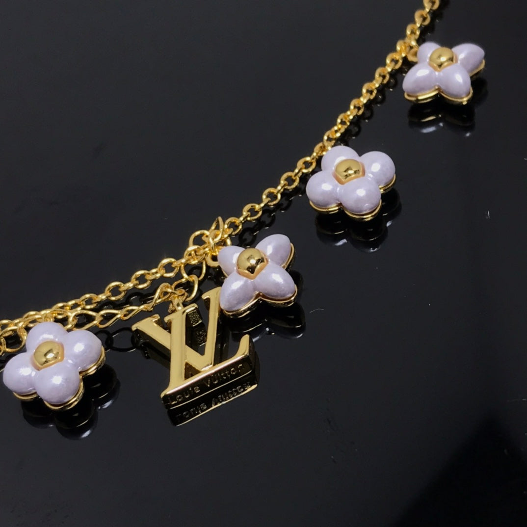 [Zalyn]LOGO 6 MOTIF STAR AND SUN GOLD BRACELET
