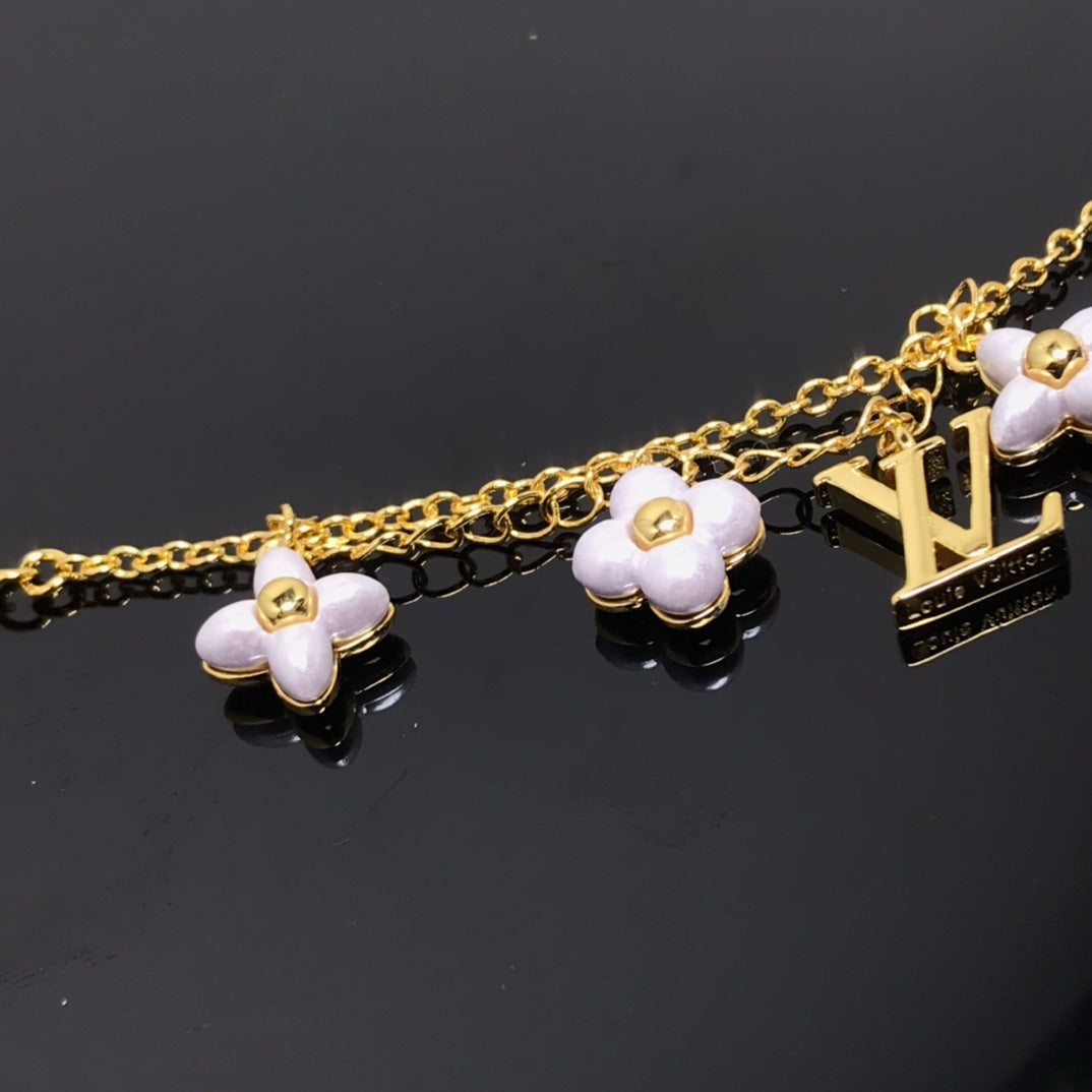 [Zalyn]LOGO 6 MOTIF STAR AND SUN GOLD BRACELET