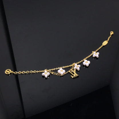 [Zalyn]LOGO 6 MOTIF STAR AND SUN GOLD BRACELET