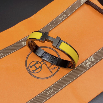 [Zalyn]CLIC HM SO BLACK YELLOW BRACELET