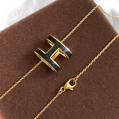 [Zalyn]HM CLIC BLACK ENAMEL GOLD NECKLACE