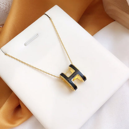 [Zalyn]HM CLIC BLACK ENAMEL GOLD NECKLACE